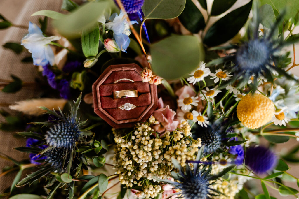 rings and florals boho fairytale wedding photo